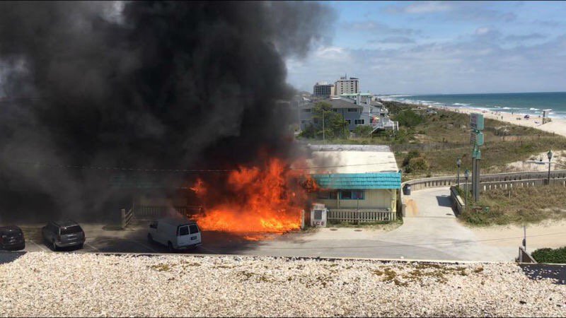 TheSkeyethis's tweet photo. This is the scene at the shops near Johnnie Mercer's Pier on Wrightsville Beach. #wral https://t.co/Eh8J0FubQS