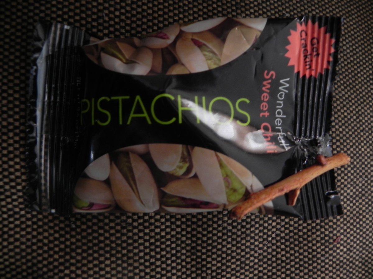 thehyruliest's tweet photo. My @getcrackin Wonderful Pistachios pack has a twig in it... Um... #doIstilleatthese #notsowonderful https://t.co/ChJWFds5J8