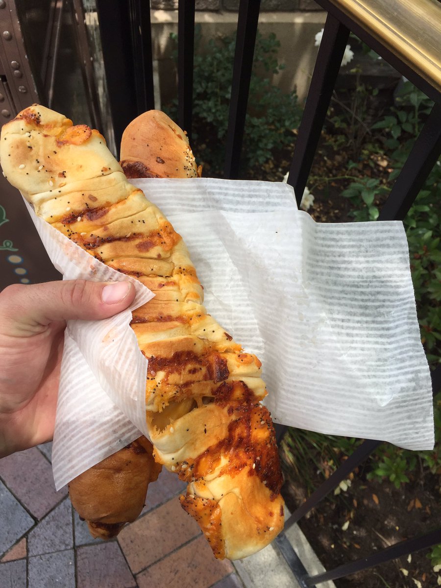 disneyguy65's tweet photo. Cheddar garlic bagel twist from Maurice's Treats, so good. #disney #foodsofdisney #foodporn #disneyland #disneyside https://t.co/rrdwyR8mEU