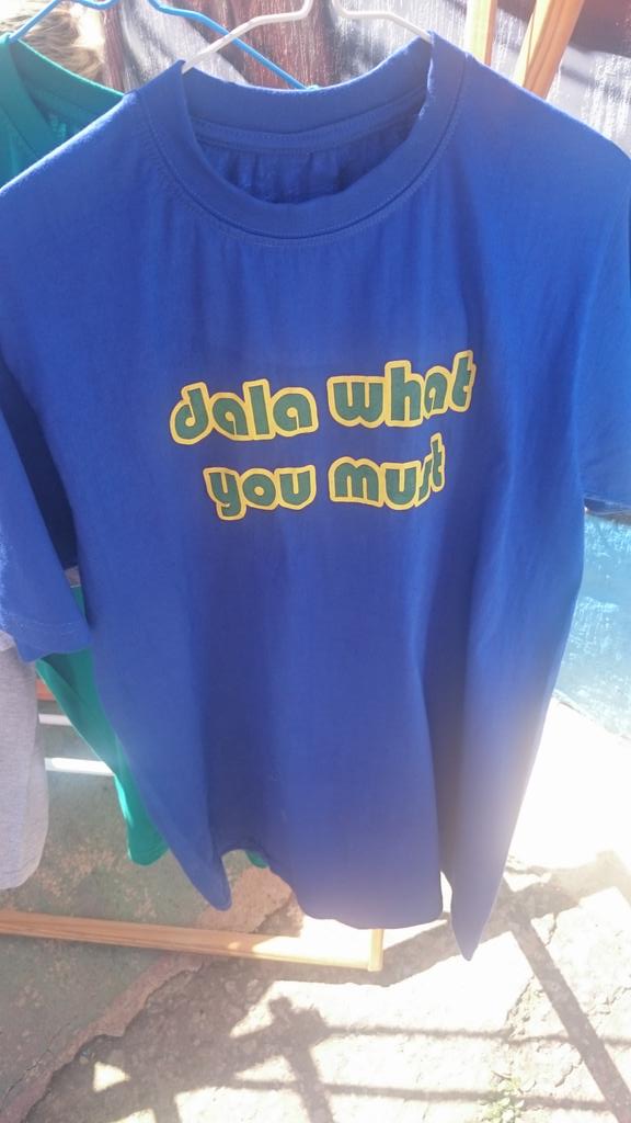shockerhess's tweet photo. So a bra of mine is selling a klompie t-shirts like this at the @TheCapeCorner today. Kwaai neh? Stiek uit and buy 1 https://t.co/zkFCZyF5X4