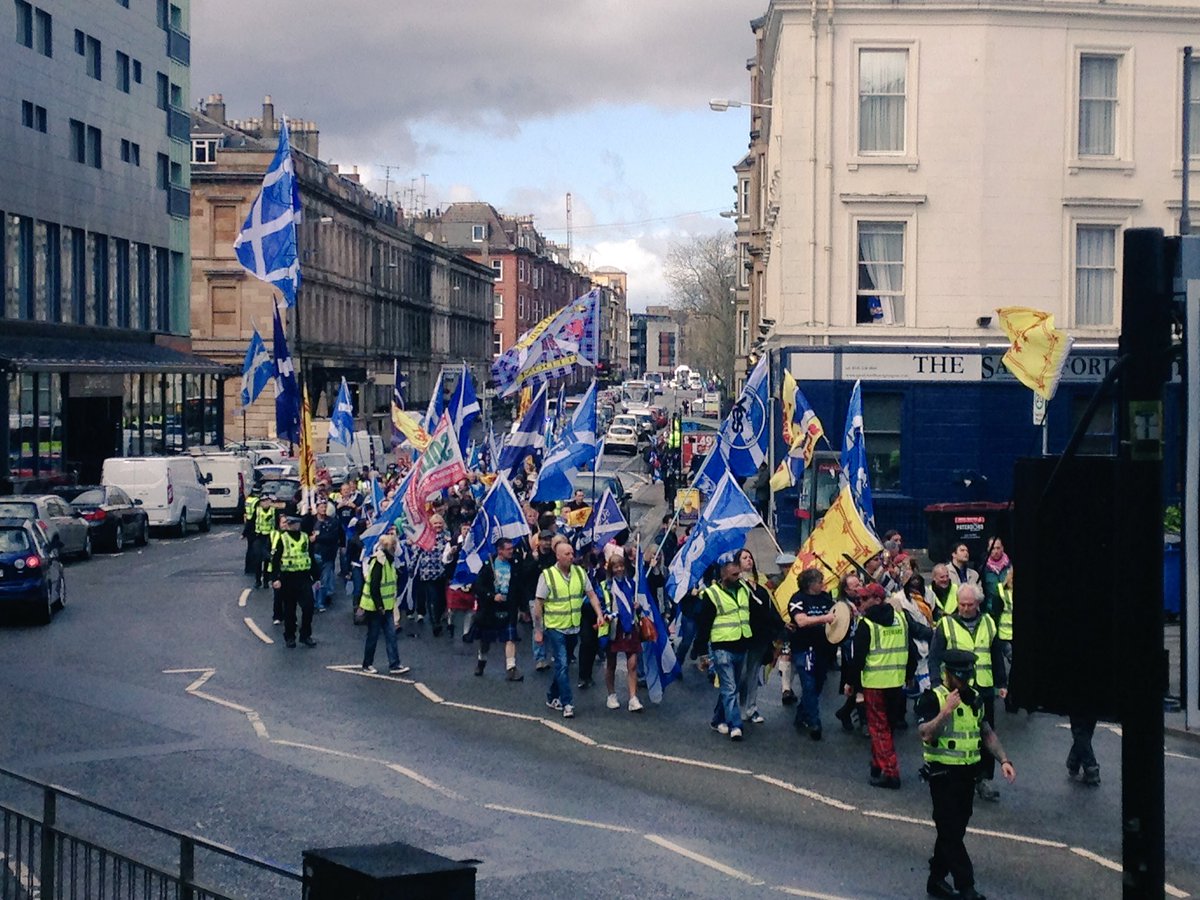 Dozens of independence supporters begin their march down Sauchiehall Street, on their way to Glasgow Green.