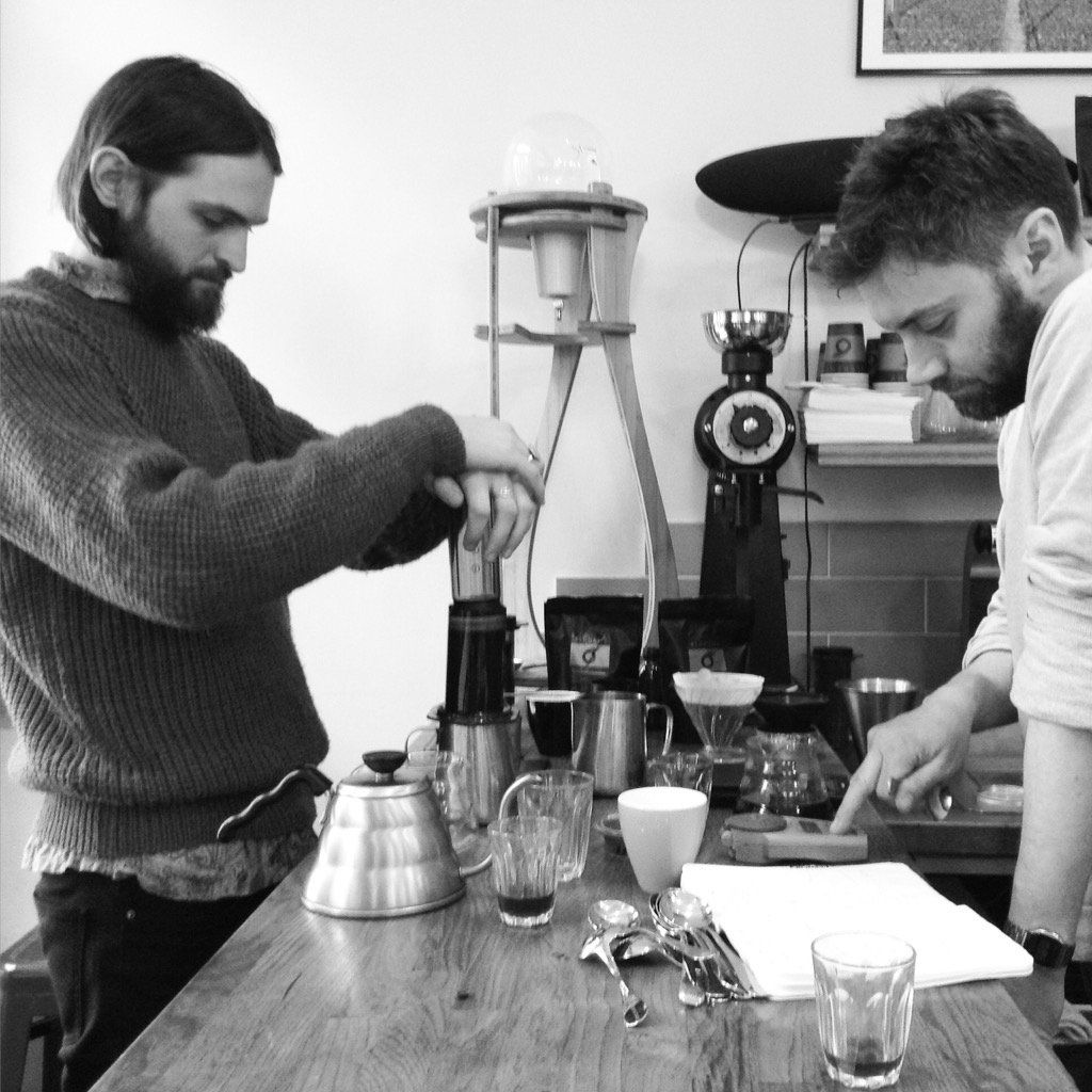 Mike and James doing some serious brewing research on their day off. Dedicated baristas!🏆