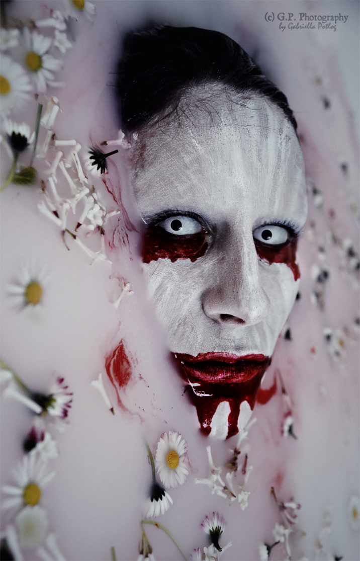 "Hello from below" by G-P-Photography is an interesting and surreal portrait