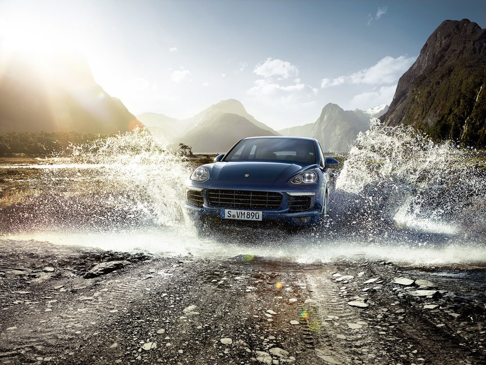 Porsche's tweet photo. You've never grown out of your desire to jump in puddles. Neither have we. https://t.co/sGKnrqcq8c