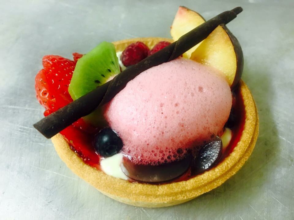 Get this at Sunday lunch tomorrow. Custard fruit tart with a berry foam.