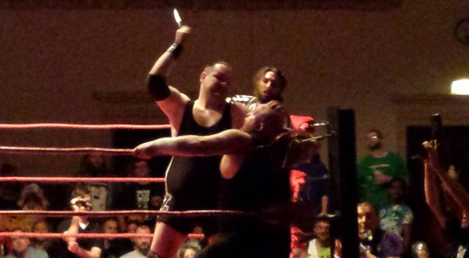 3ropesdotcom's tweet photo. @TremontCZW takes the abuse from @DJHyde_1 on way to a victory via death valley driver through a set of chairs. https://t.co/BoNVGmDKUh