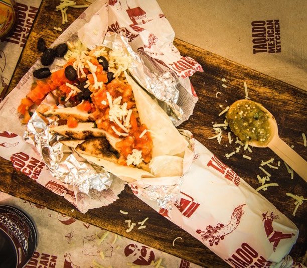 DXB's tweet photo. Grab your free burrito before you fly! 🌯✈️ On May 11, head upstairs to Taqado in DXB's Concourse D! #TaqadoTakeOver https://t.co/CetWrxFLlp