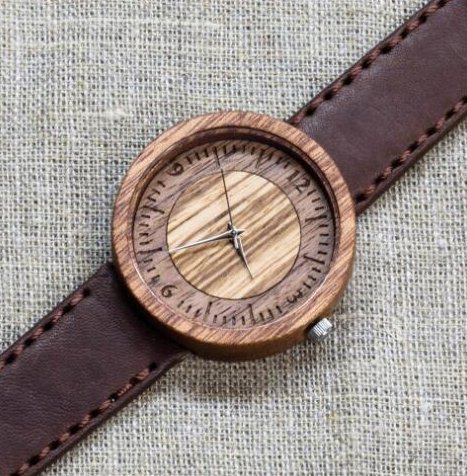 KcoInt's tweet image. Une montre avec un cadran en bois
vente par internet kcoint-international.com