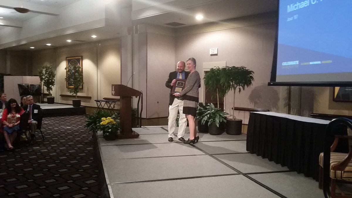 MUCommAlumni's tweet photo. #MUDCCAA By-Line Award:  Michael Hiestand, accepting from Interim Dean Dr. Ana Garner https://t.co/nJTdrzBuVK