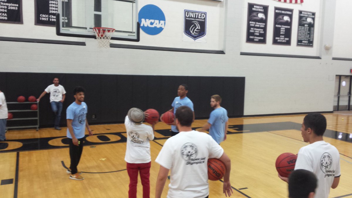 CoachAdamTurner's tweet photo. Zach, Saleem and Armando teaching the young guys how to shoot!! @BardBasketball going hard here @SpecialOlympics Day https://t.co/sEVM63UgoL