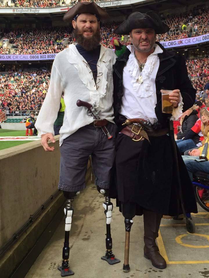 colinvaudin's tweet photo. A photo of two wounded veterans at the Army V Navy Rugby game at Twickenham yesterday. #armyhumour #respect #courage https://t.co/060YBc0AWG