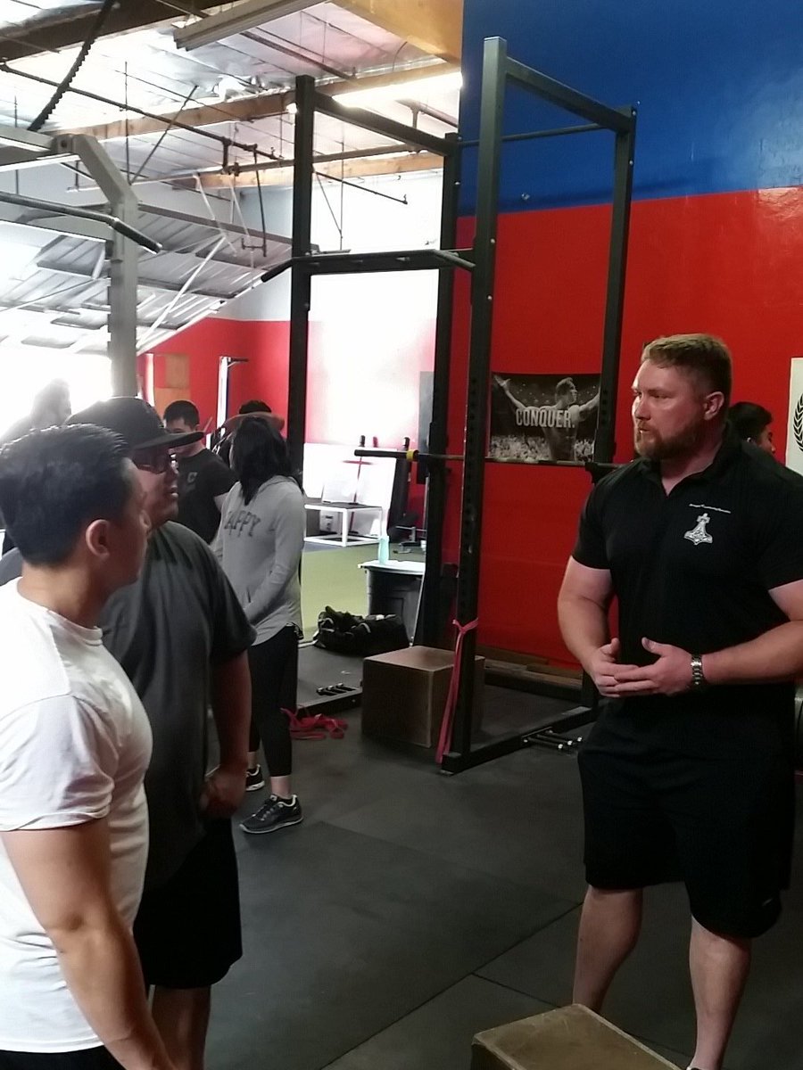 Coach Casey (<a href="/garrisonpower/">GarrisonPowerHouse</a>) working small group workshop for squat.  Come get it!