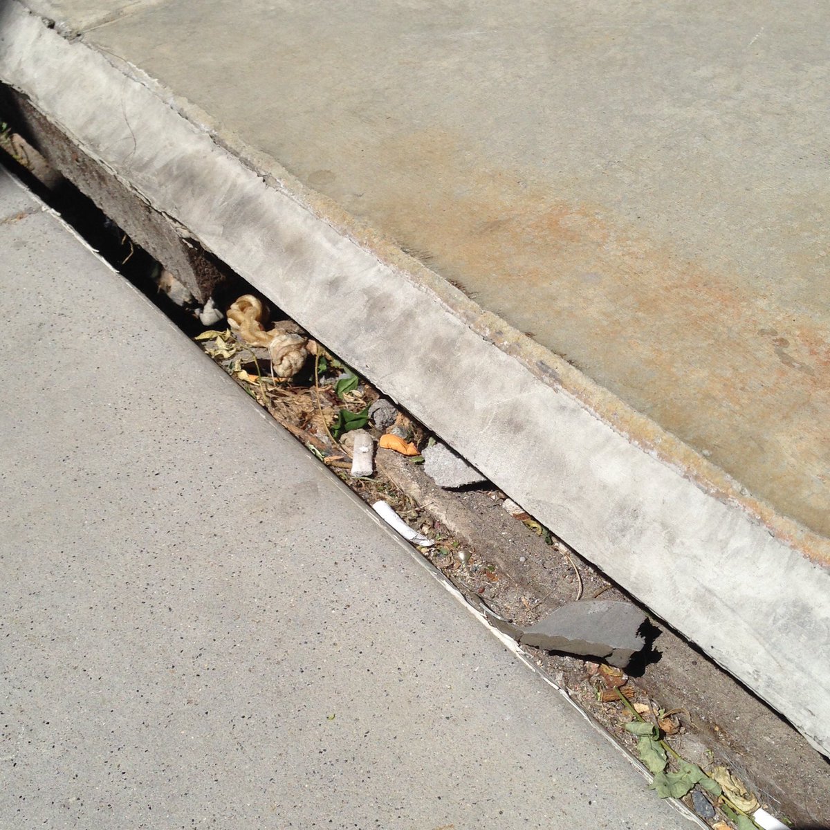 crackmon's tweet photo. What's causing ground subsidence in the San Francisco Mission District? #GotCracks #concrete https://t.co/plNJKBOA1W