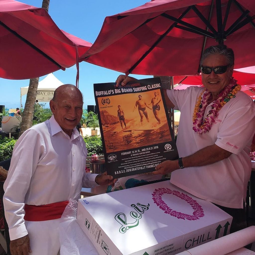 Waikiki Beach Boys Richard "Baby" Bell and Ted Bush holding up a vintage surfing poster. #… ift.tt/1X312t2