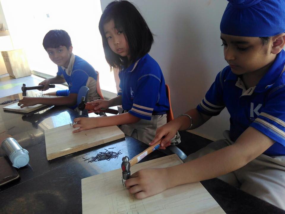 KEDSchool's tweet image. Kids at #Kunskapsskolan learning the #art of nailing and creating wonderful art features at their #CarpentryWorkshop