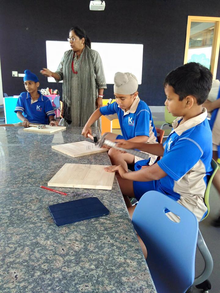 KEDSchool's tweet image. Kids at #Kunskapsskolan learning the #art of nailing and creating wonderful art features at their #CarpentryWorkshop