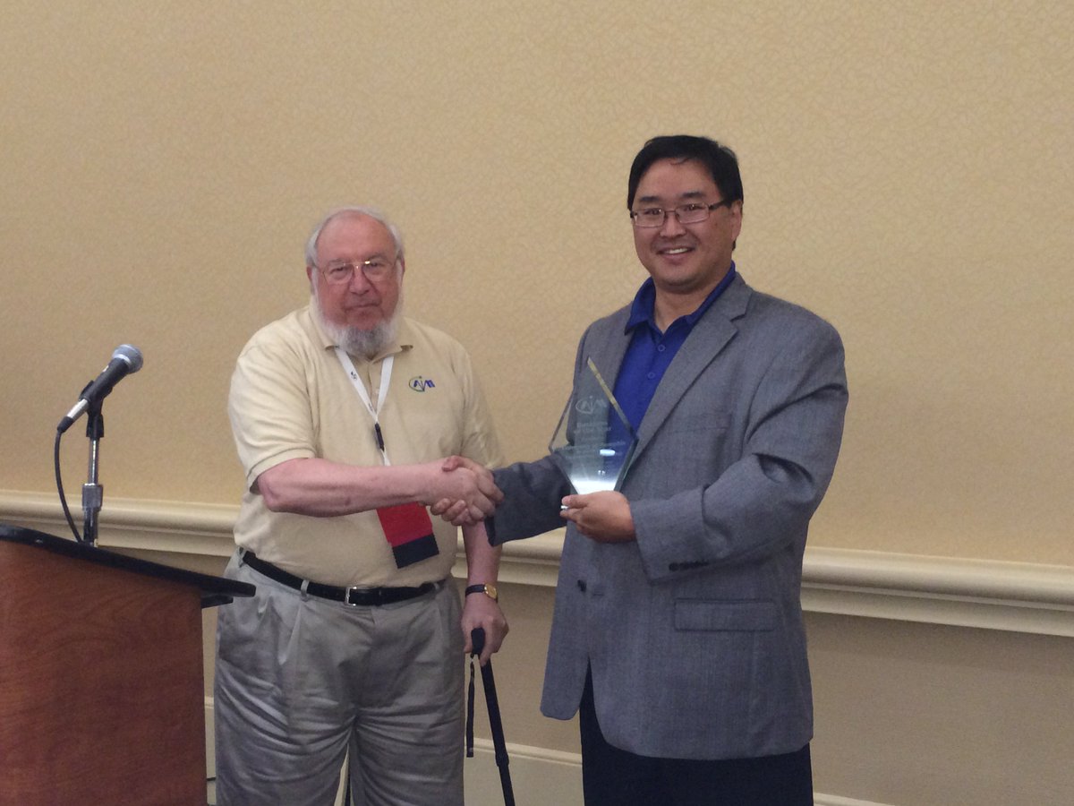 AIM_Inc_'s tweet photo. Congrats to @uofmemphis's Kevin Berisso on winning the AIM NA Professional of the Year! #AIMYAwards #AIMSummit https://t.co/CI494VPOMd