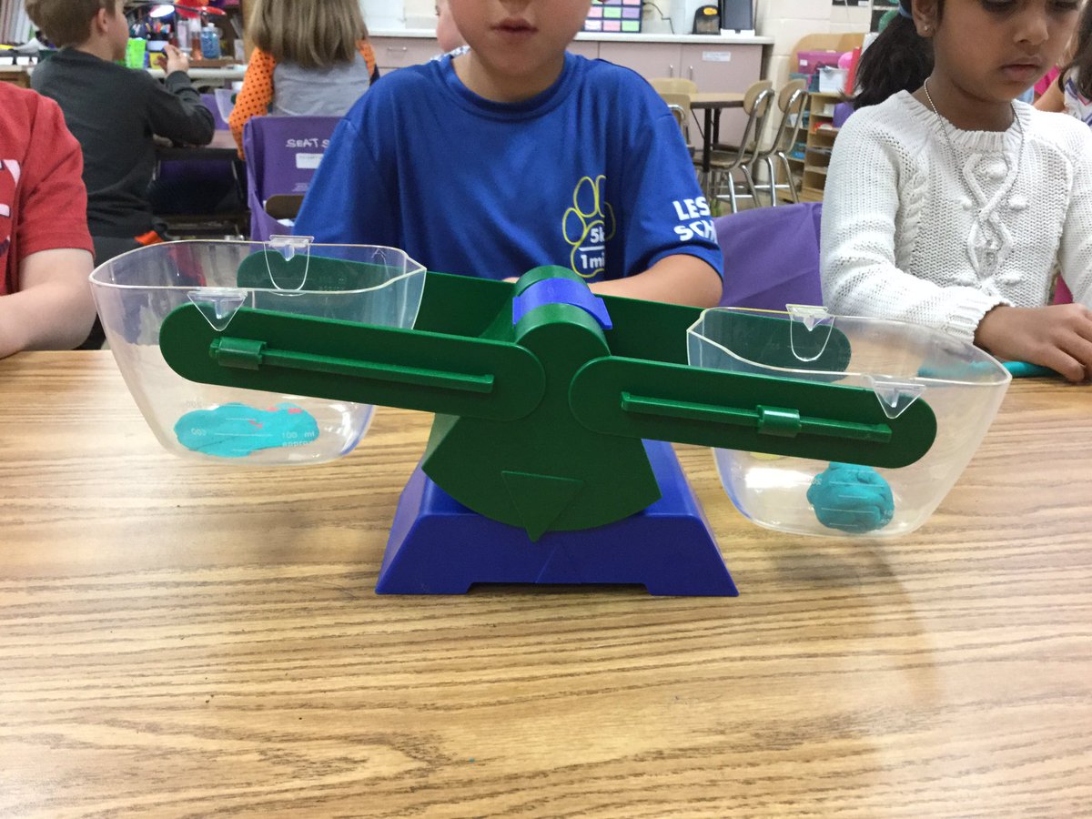 Using play dough to show how different shapes can still have the same weight. #le58rocks #dg58learns