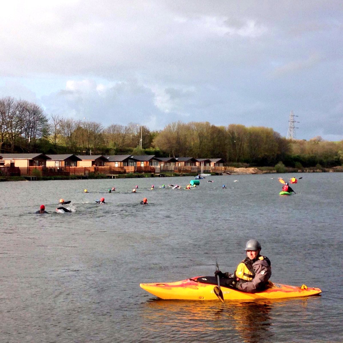 COLTtriathlon's tweet photo. Only the brave. Or crazy. Welcome to open water season! ❄️ https://t.co/OzdJO23kaK