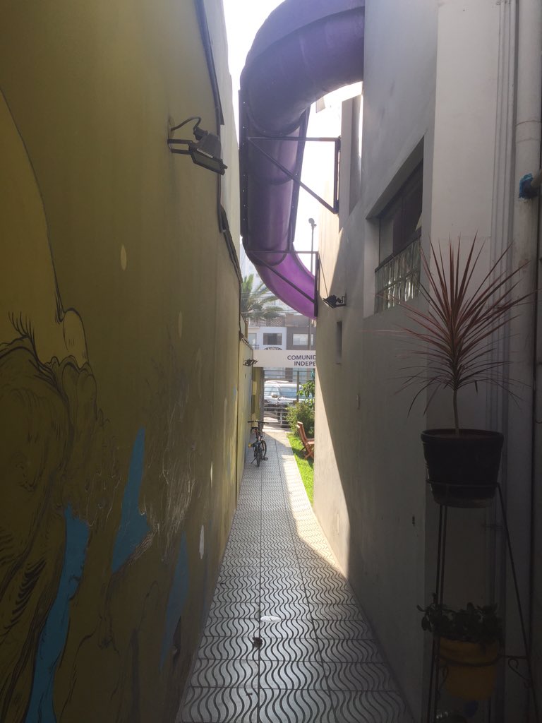 jaimeohm's tweet photo. This month, our Coworking space is beautiful. Great art, color, plants, lighting, slide. #remoteyear @residenciaCW https://t.co/7mAA0RU7Un
