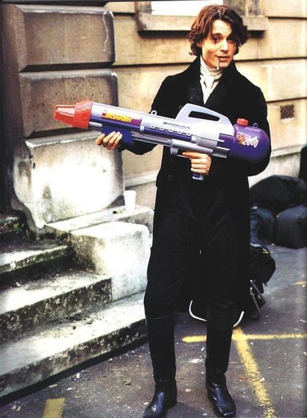 MakingTheMovies's tweet photo. Johnny Depp smoking a blunt and holding a super-soaker on the set of Sleepy Hollow, 1999.

#BehindTheScenes https://t.co/3FZQOexjC3