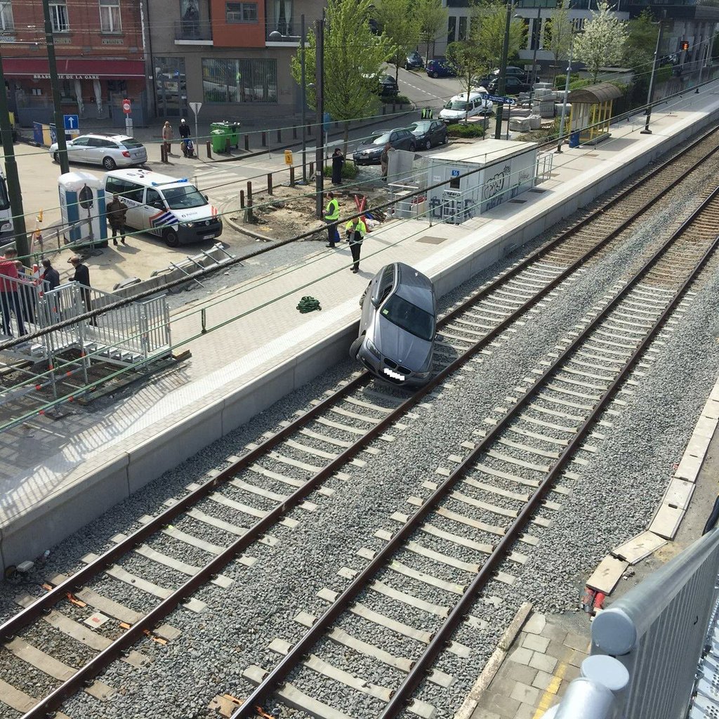 grescoe's tweet photo. Depressed about imminent end of car culture, another automobile throws itself on the tracks (to the future). https://t.co/4dVldUU7C4