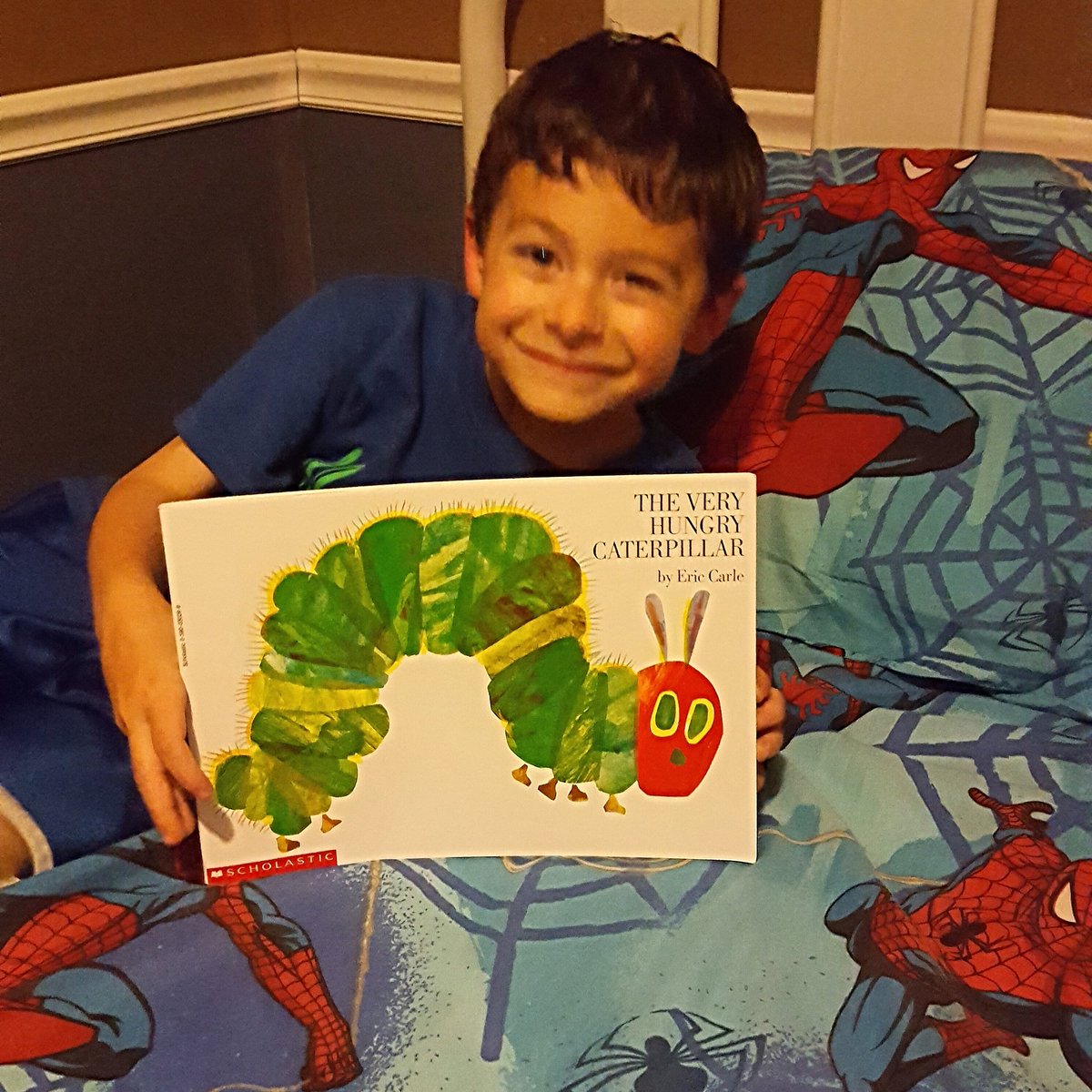 apple0111's tweet photo. So proud of my super Cooper. He just read the Very Hungry Caterpillar to me. https://t.co/8gwSlECJCu