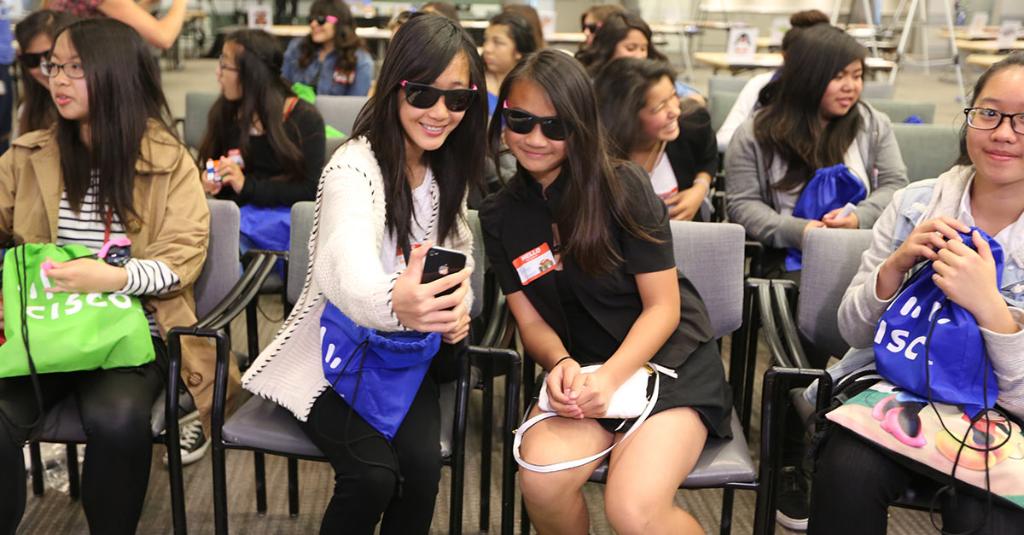 Cisco's tweet photo. See how Cisco employees inspired the next wave of innovators at this year’s #GirlsPowerTech: https://t.co/YN9tYIHmL5 https://t.co/gRkAaIpiDr