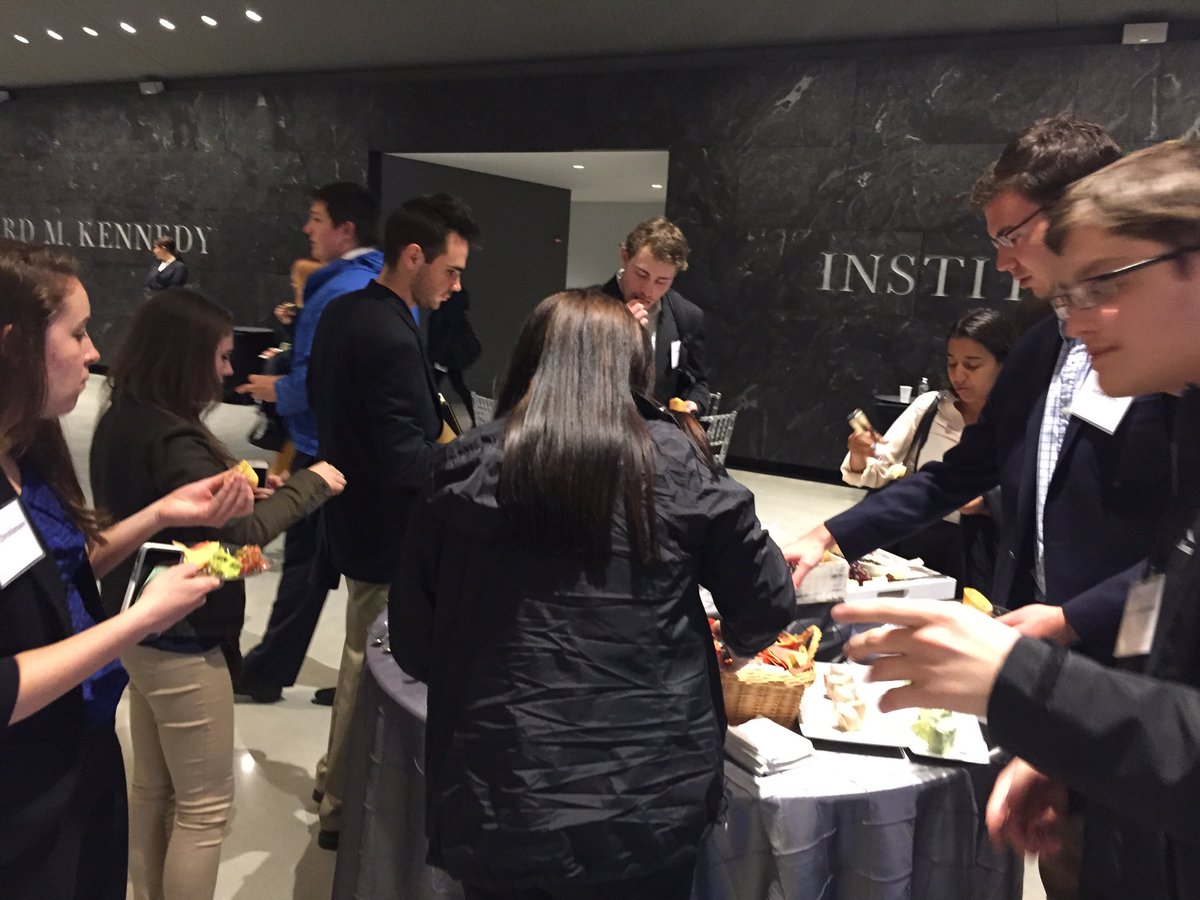 AlexDeJuice's tweet photo. #POL390 swarming the food table after the #YouthTownHall https://t.co/szkY7TlbiX