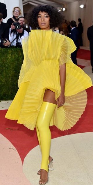 WordOnDStreet's tweet photo. @WordOnDStreet - @solangeknowles wearing a yellow fan dress by #davidlaport #MetGala2016 #solange #nyc #MetBall https://t.co/CCNgBIvroe