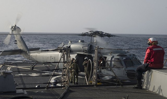 USNavyEurope's tweet photo. Taking off &amp; landing a Seahawk on a moving, shifting landing pad; another day at the office for #USSPorter &amp; #HSC28 https://t.co/HlL37m7LMg