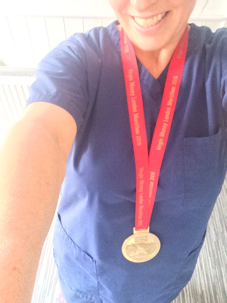 RunningMidwife's tweet photo. Back to work. Night shift number 1. Scrubs: check. Clogs: check MARATHON MEDAL: check @NHSAdrianO https://t.co/hYAo8Vq81T
