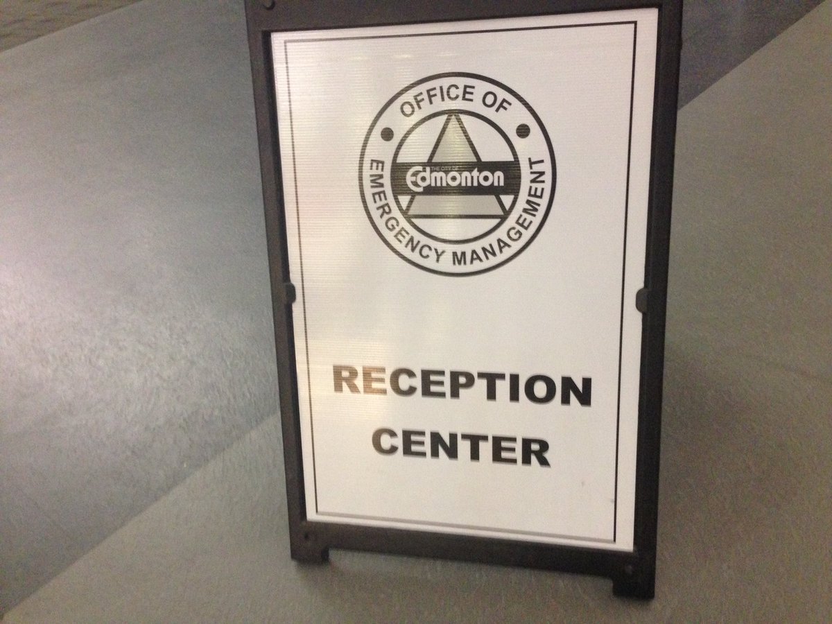 SarahRyanYEG's tweet photo. Here's the official sign welcoming #ymmfire evacuees to #yeg @Northlands Expo Centre. Halls A &amp; D setting up now. https://t.co/7bzX9d2Jyy