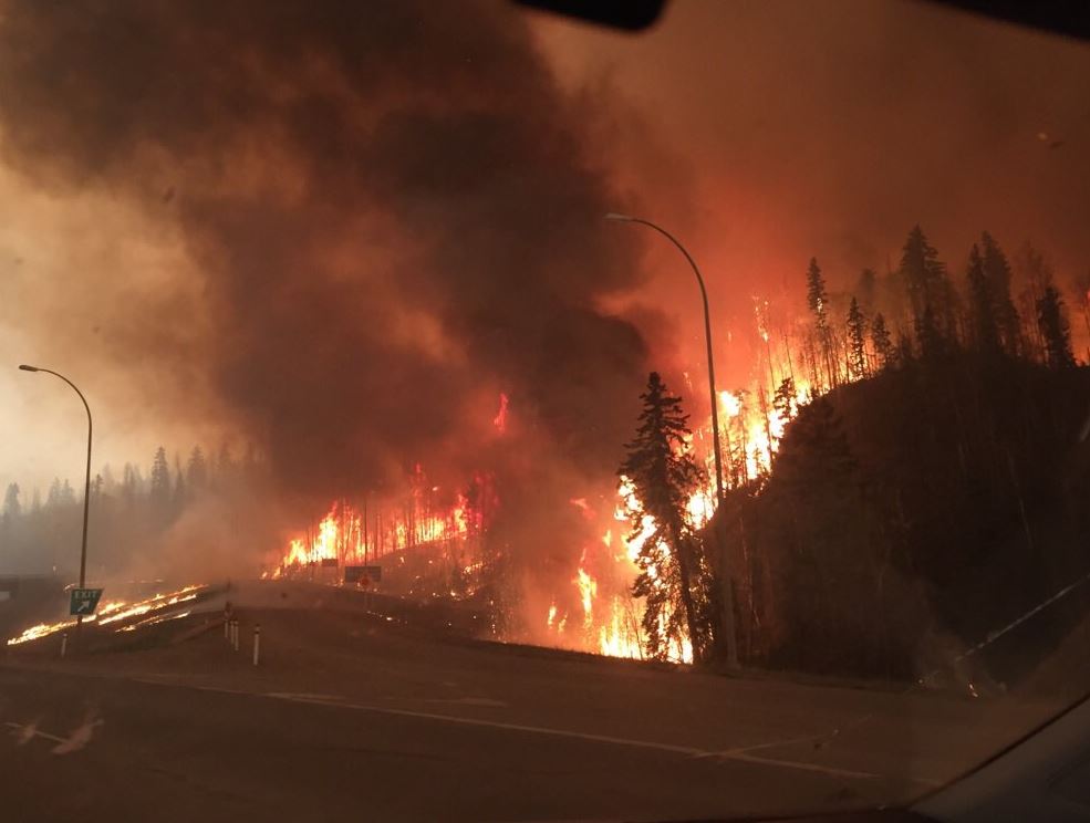 weathernetwork's tweet photo. A devastating time for Fort McMurray. 80% of Beacon Hill homes destroyed: https://t.co/IQWA99wrxs #ymmfire https://t.co/HJGeODPNiG