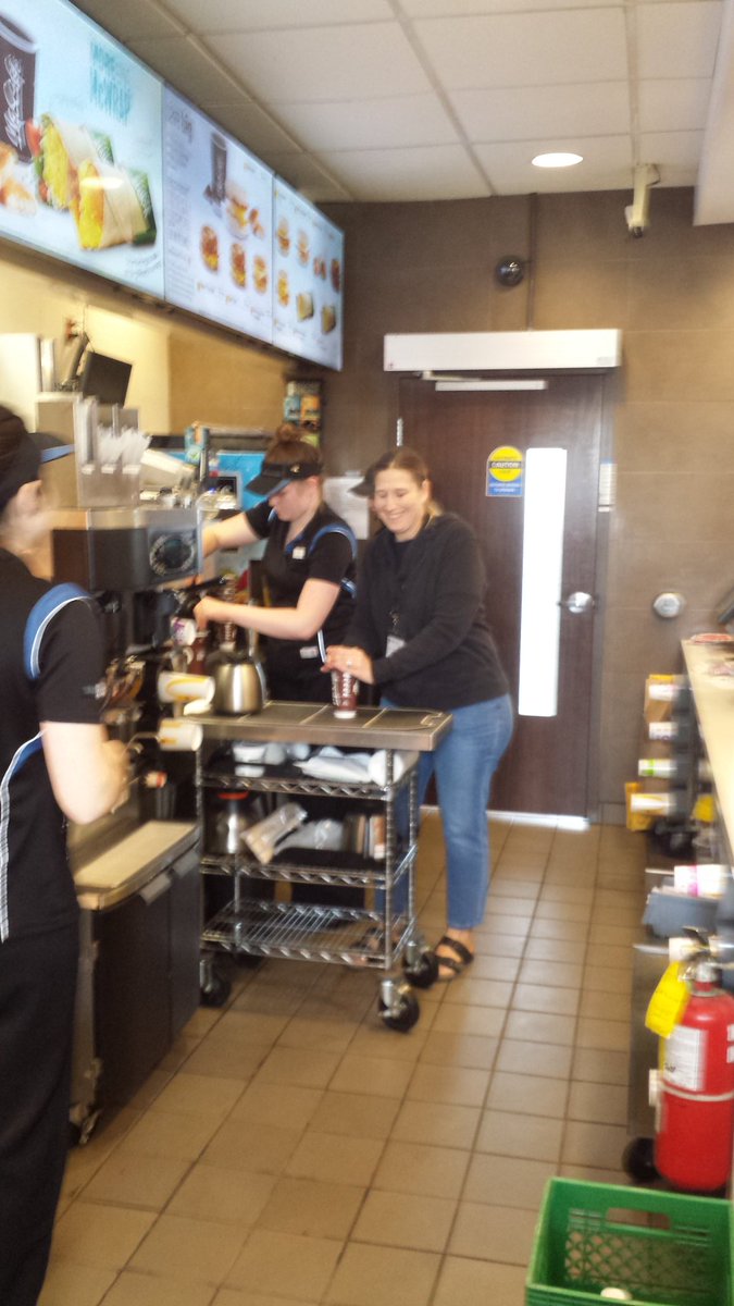 MSB VP Kim Cation volunteers to serve coffee at McDonald's for McHappy Day.