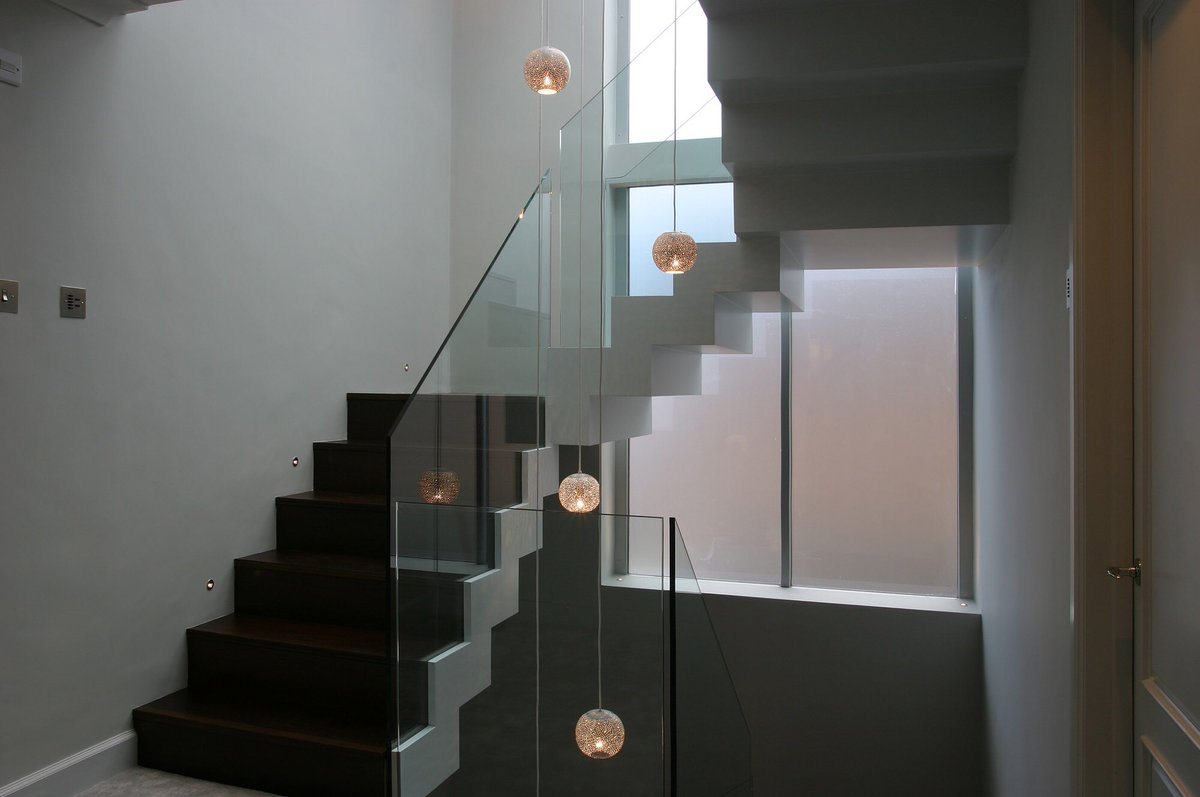 designedbylight's tweet photo. A cluster of our Rita 150 #pendant lights hanging down a stairwell #interiordesign #lighting #lightingdesign https://t.co/pHWoqKYhh0
