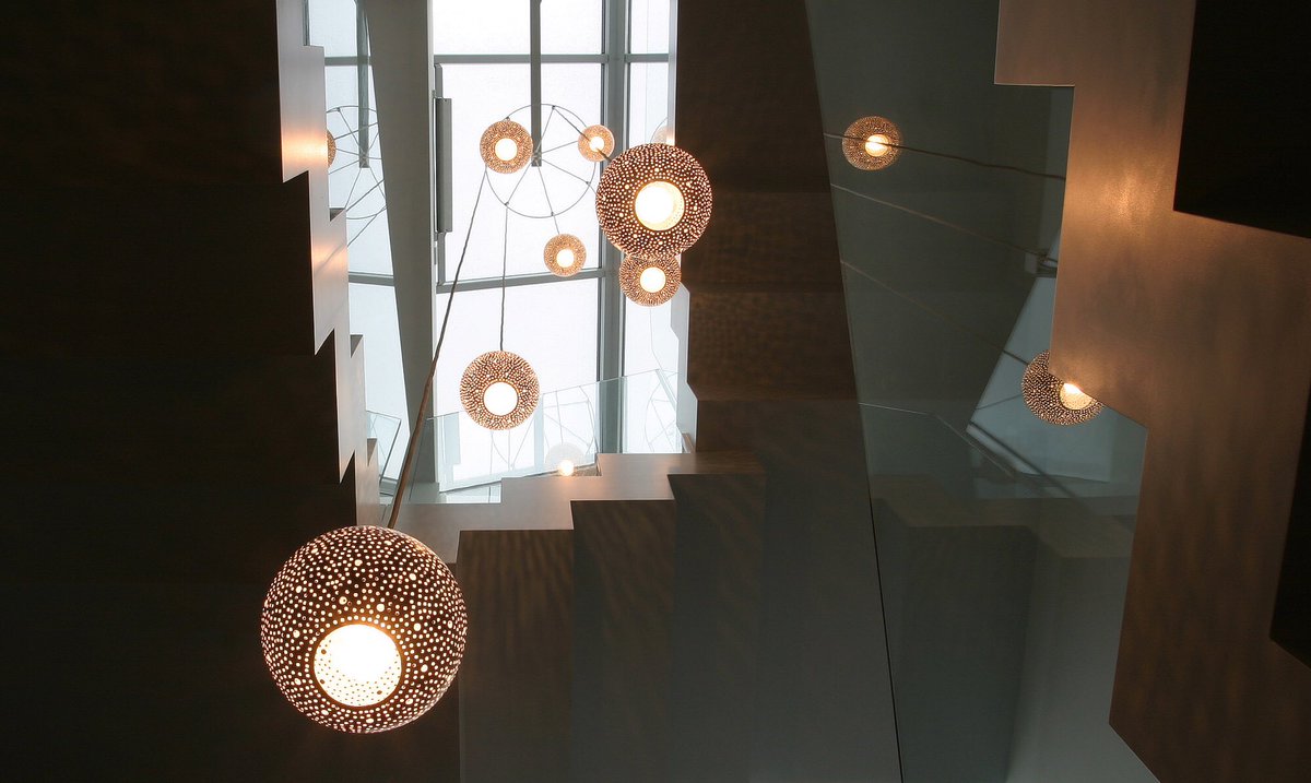designedbylight's tweet photo. A cluster of our Rita 150 #pendant lights hanging down a stairwell #interiordesign #lighting #lightingdesign https://t.co/pHWoqKYhh0