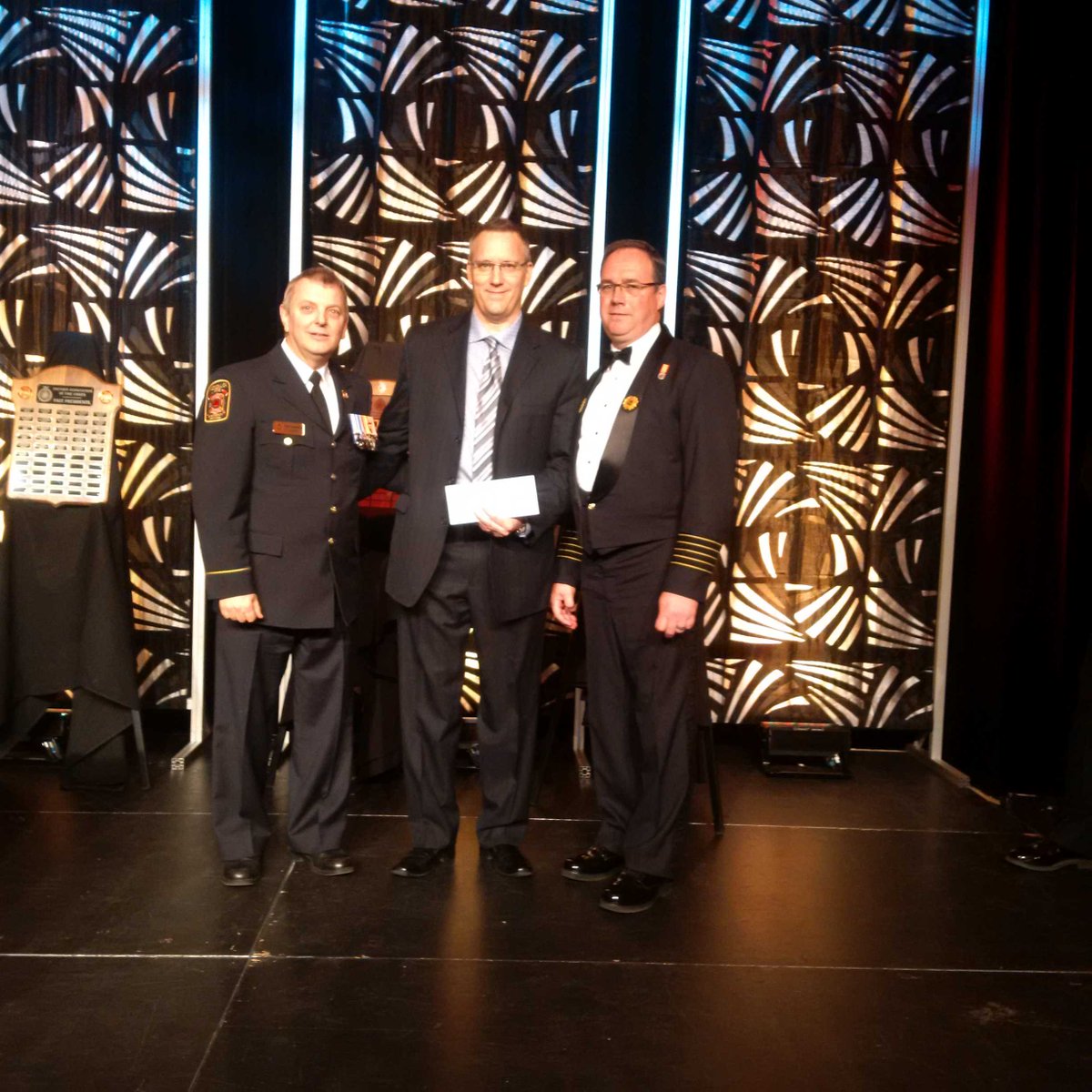 .<a href="/LaddersUpCanada/">Ladders Up</a> cheque to <a href="/CanFirefighters/">CFFF</a> at @OnFireChiefs gala; more than $23,500 in 2016, total of $150,000!!