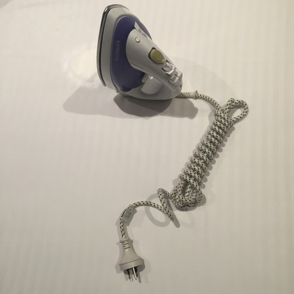 calbo's tweet image. When hotels do this to their iron cords, it always feels like a veiled threat.