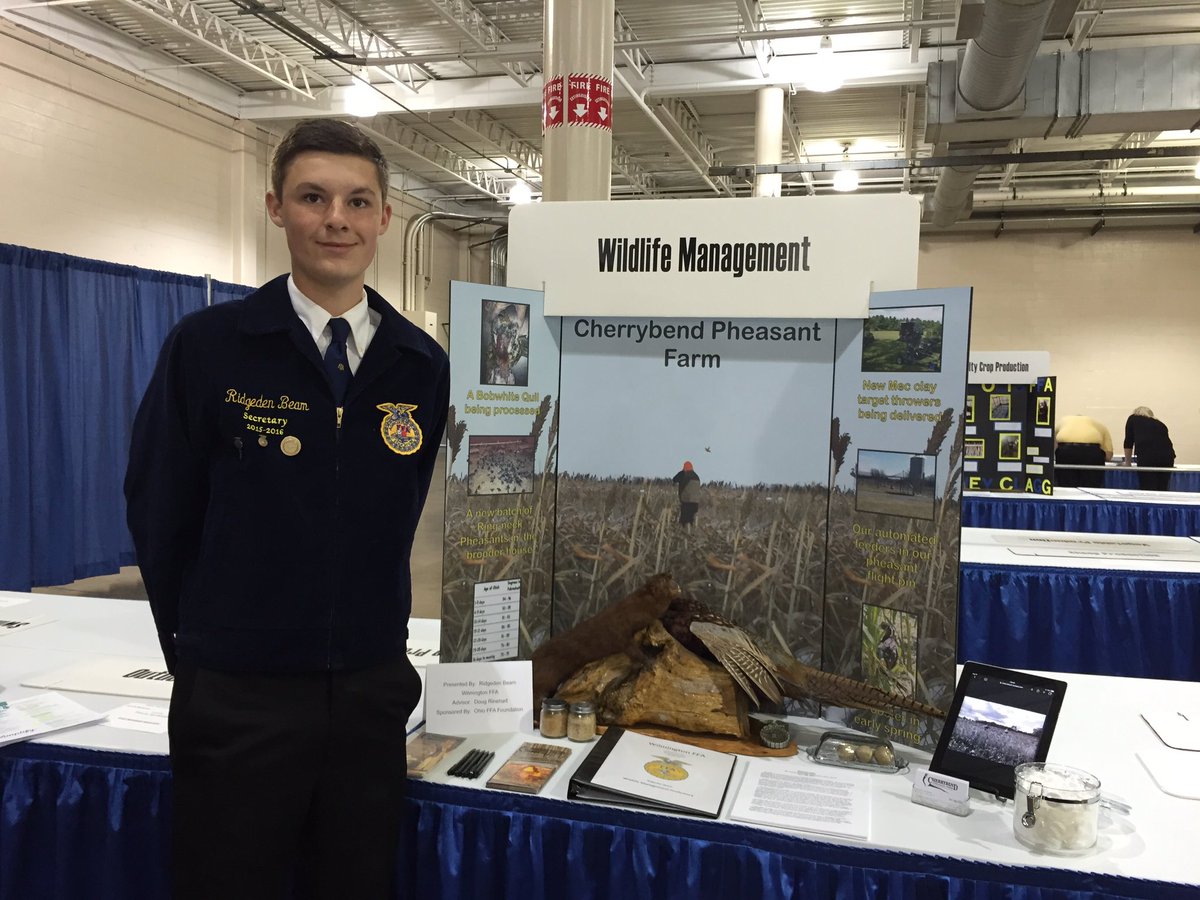 Ridge Beam with his display as FFA State Proficiency Finalist.