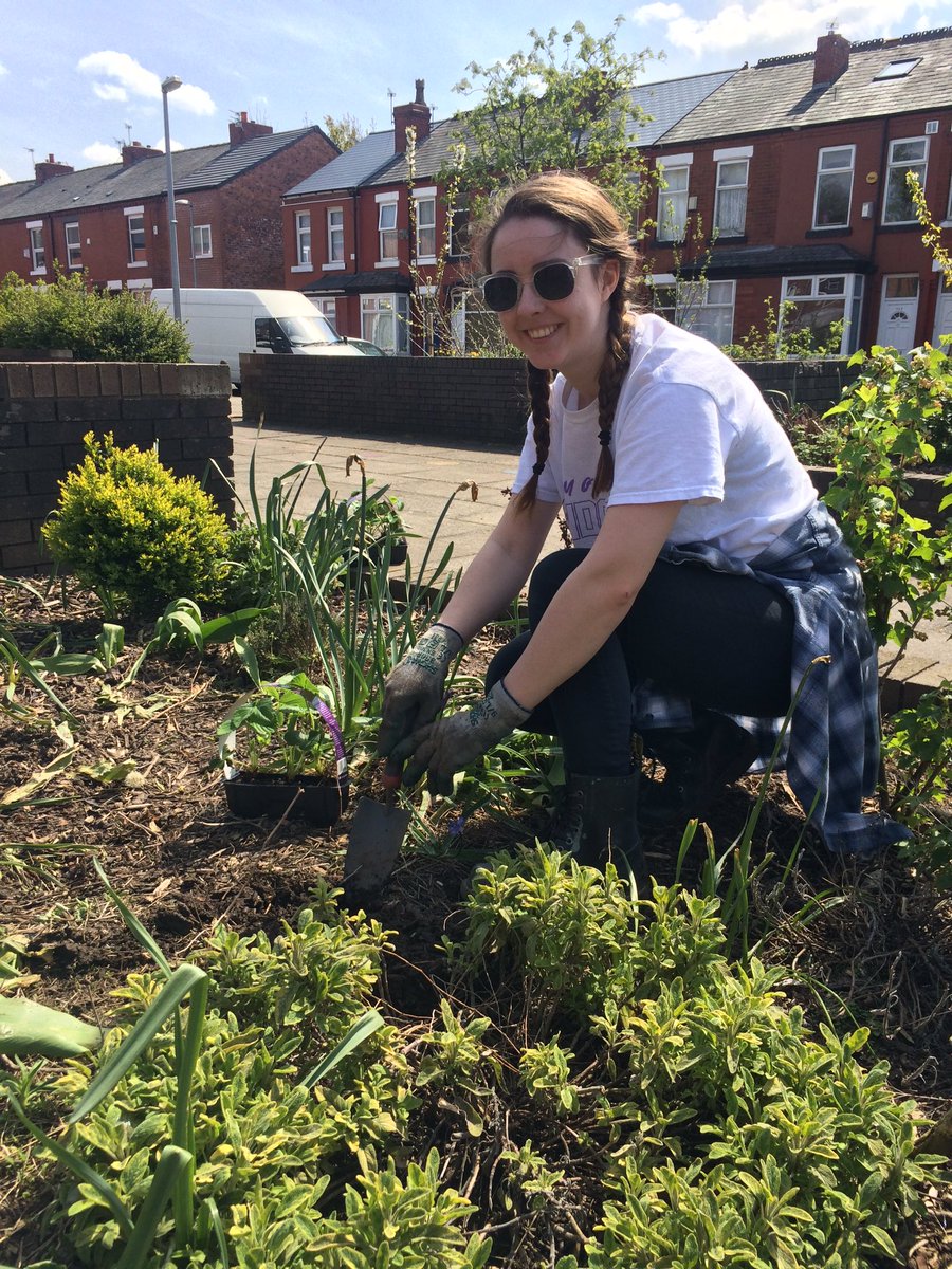 Pharmacy student Zoe planting strawberries in <a href="/IncrEdibleManc/">IncredibleEdible Mcr</a>   plot at Braemar &amp; Brailsford
