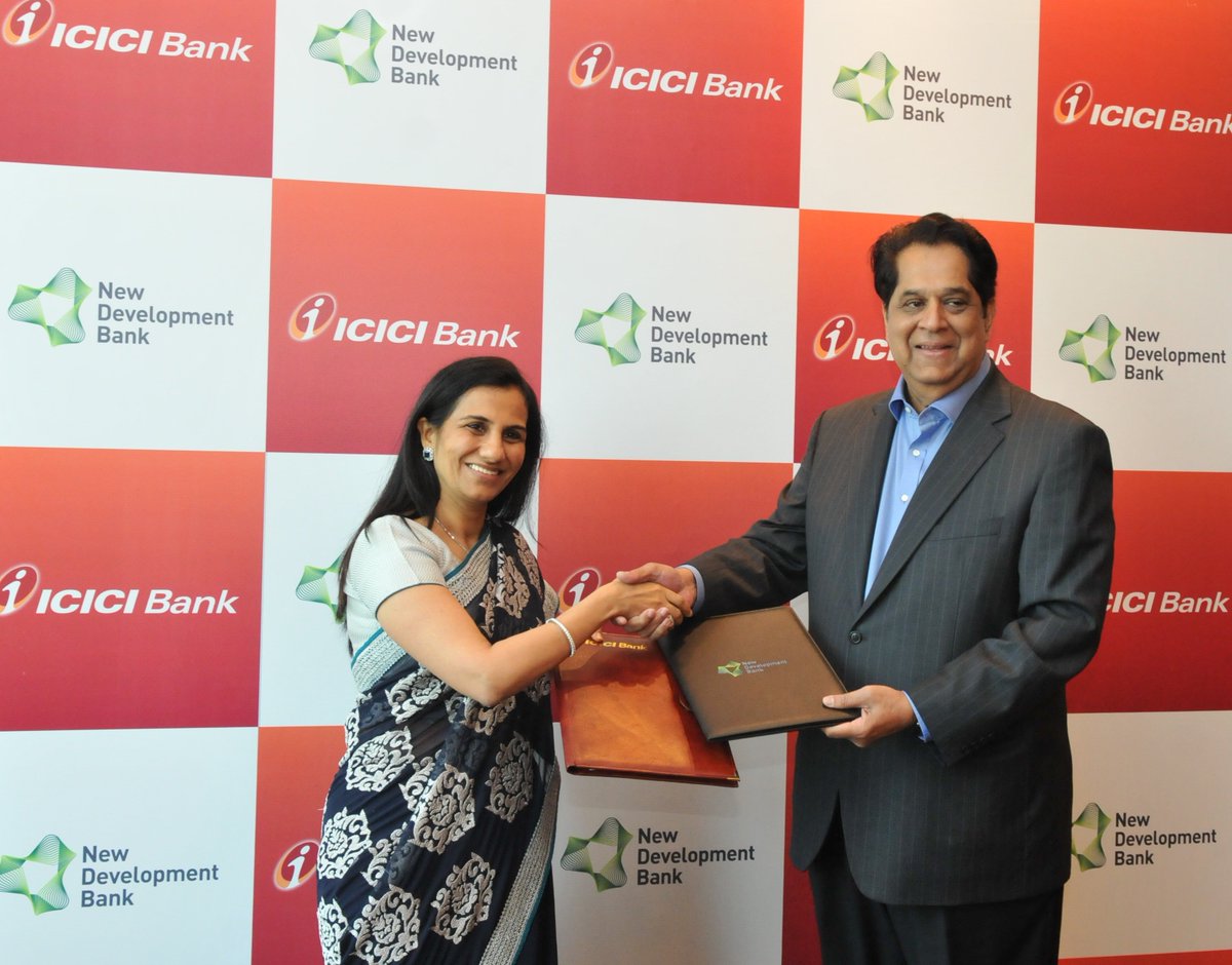 ICICIBank's tweet photo. Mr K.V Kamath,President, NDB &amp; Ms Chanda Kochhar, MD &amp; CEO, ICICI Bank after signing an MoU for business partnership https://t.co/1ZWFPls7TN