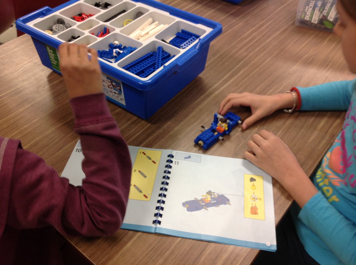 Forest Glen iLab - Determination in action!  Lots to do in the lab and in our class weaving isn't just for girls.