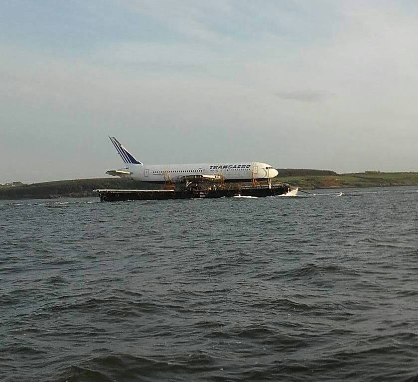 Only in Ireland! A @Boeing 767 travelling by barge up the west coast of  Ireland #ThatwouldbesomeShout @RNLI