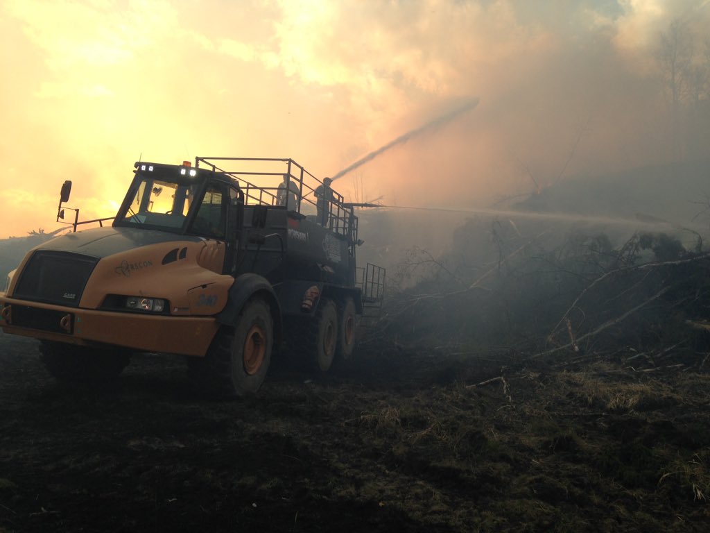 work4wilco's tweet photo. #ymmfire #hydrosaurus ##FortMacFire  Over 100,000 gallons of water put on fire break today https://t.co/i2sVZiGFDs