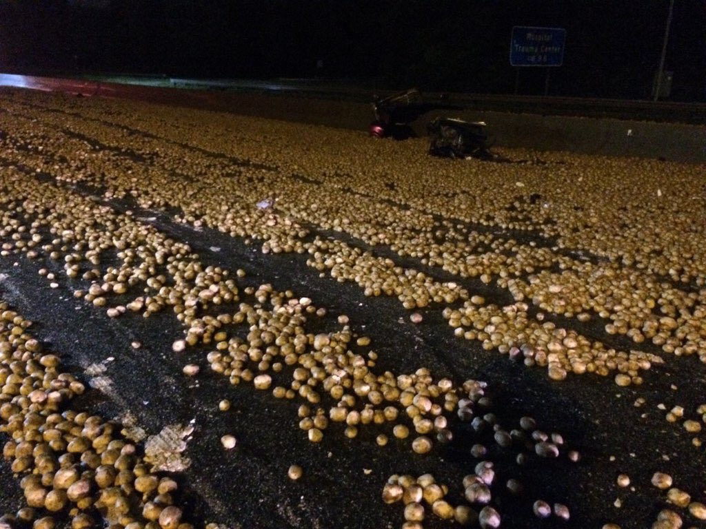OfficialJoelF's tweet photo. Truck spills 50,000 pounds of potatoes onto I-77 in North Carolina. Traffic backed up for miles. https://t.co/f6GcPH1pRR