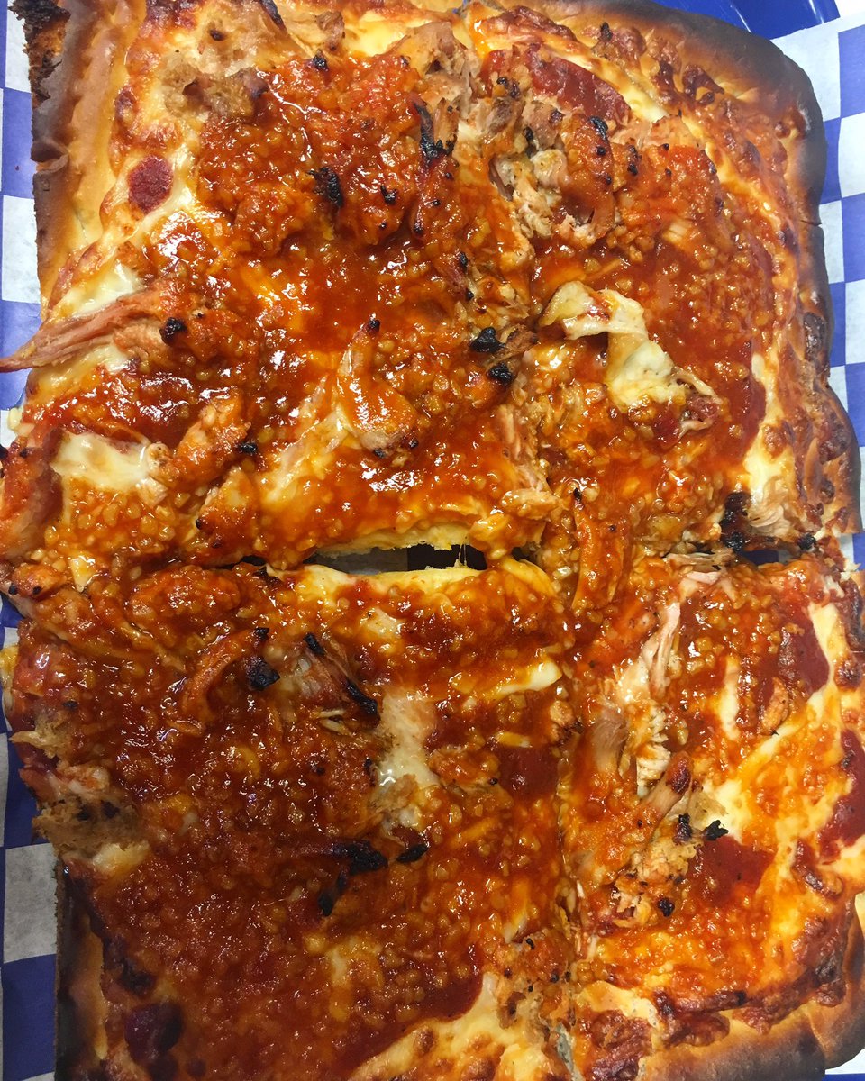 Smoked buffalo chicken wing pizza with red garlic sauce!