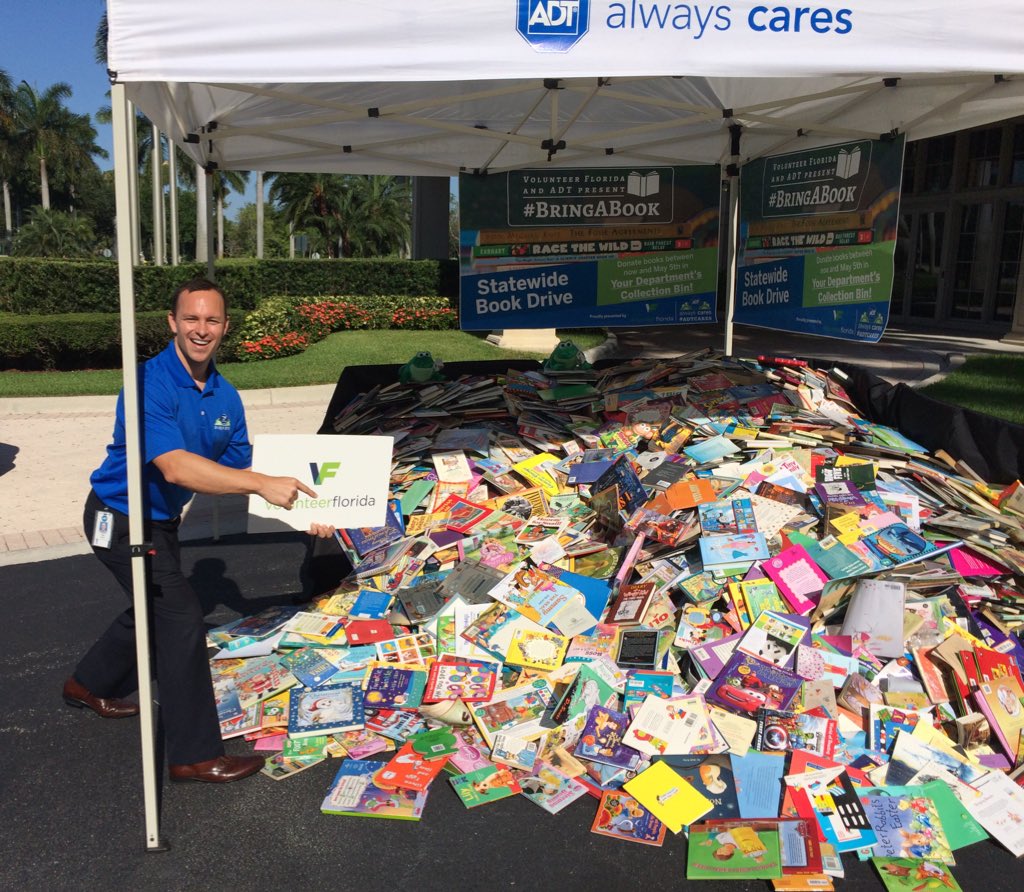 Guess how many books are in this pile?! <a href="/ADT/">ADT</a> is proud to partner w/ <a href="/VolunteerFla/">Volunteer Florida</a> on the #BringABook #ADTcares