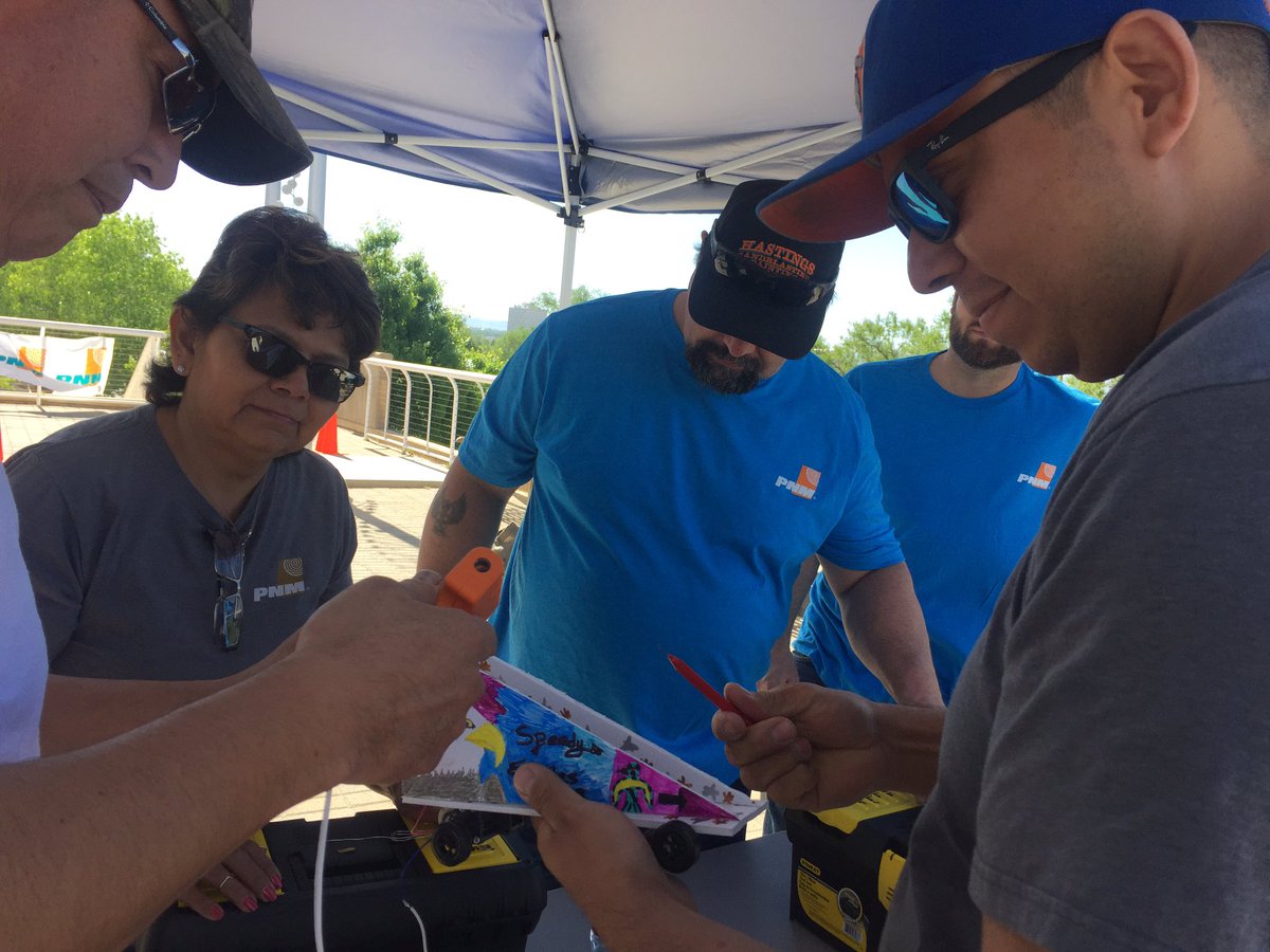 PNMtalk's tweet photo. The pit stop is busy fixing repairs before the race! #PNMsolar @Explora_NM follow along as we live tweet! https://t.co/ZpwxsHjTvO