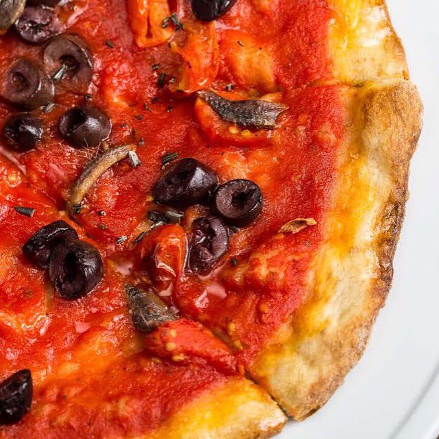 Napoli Pizza with Tomato Sauce, Kalamata Olives, Roasted Tomatoes &amp; Anchovies! bit.ly/1Tsnfek